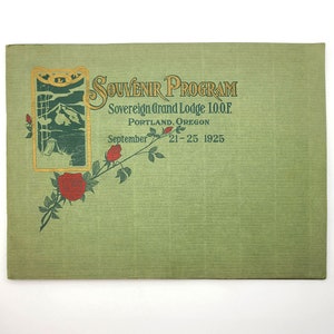 May include: A green souvenir programme booklet with gold lettering for the Sovereign Grand Lodge I.O.O.F. in Portland, Oregon, September 21-25, 1925. The cover features a stylised illustration of a mountain, a tent, and a rose.