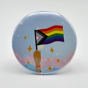 Botón con el logo del orgullo del progreso de 1,45"