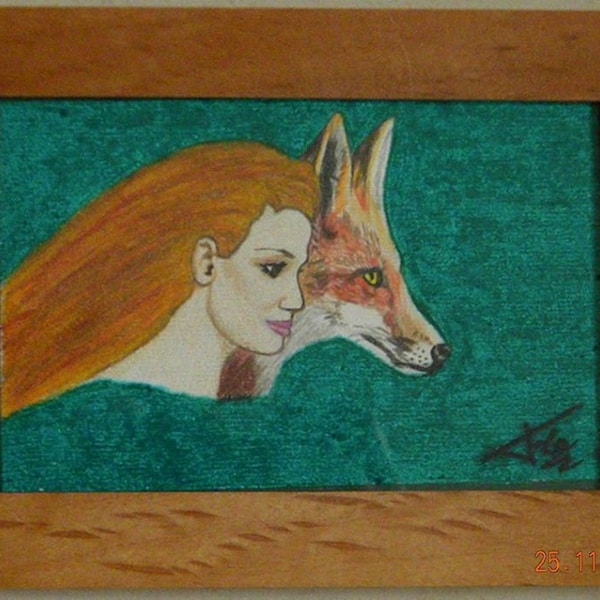 Renard et femme en dessin sous cadre en verre.