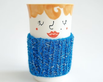 Funny unique handless tumbler, with a nice hand-knitted wool sleeve