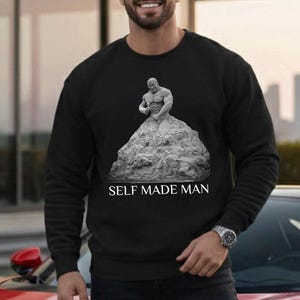 Self-Made Man chiseling himself from rock Sweatshirt | Motivational Sculpture Illustration