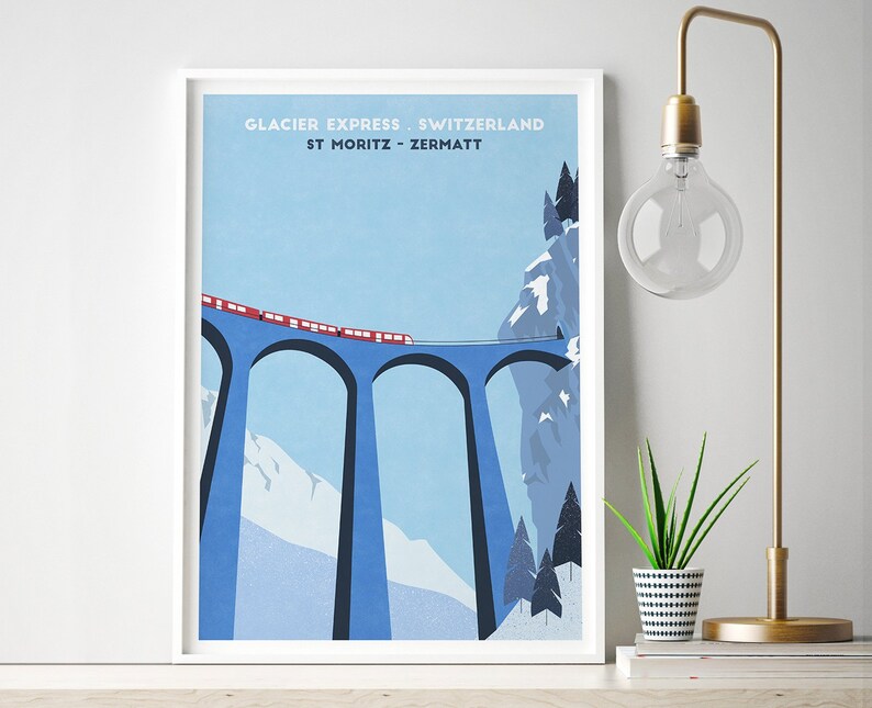 May include: A vintage-style poster with a blue and white illustration of a red train traveling over a bridge with three arches. The poster has the text "Glacier Express Switzerland St Moritz - Zermatt" at the top.