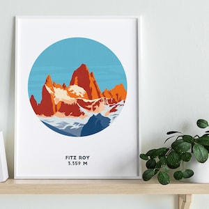 May include: A framed print of a mountain range with a blue, white, and orange color scheme. The mountain range is called Fitz Roy and is 3,359 meters tall.