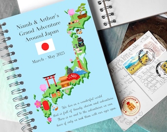 May include: A blue travel journal with a map of Japan and the text "Niamh & Arthur's Grand Adventure Around Japan" and "March - May 2025". The journal has a spiral binding and is perfect for documenting a trip to Japan.