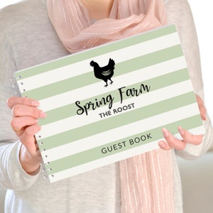 May include: A spiral-bound guest book with a light green and white striped pattern. The cover features a black silhouette of a chicken, the words "Spring Farm The Roost", and "Guest Book" in a script font.
