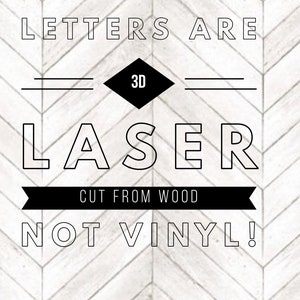 Puede incluir: Dise&ntilde;o gr&aacute;fico en blanco y negro sobre un fondo de madera blanca. El texto dice "LETTERS ARE 3D LASER CUT FROM WOOD NOT VINYL!"