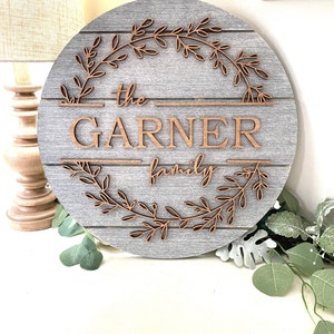 Pictured is the 15" Sign in Grey with Stained Design.