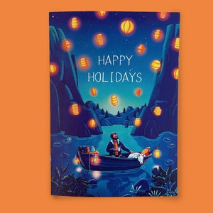 Jeu de cartes postales pliables avec des lanternes flottantes atmosphériques la nuit | Homme avec un chien dans une forêt |