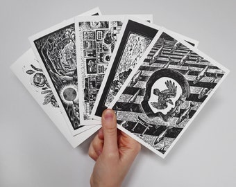 May include: Five black and white illustrated postcards. The postcards feature a variety of images, including a forest scene, a cityscape, a bird in flight, and a fish pattern.