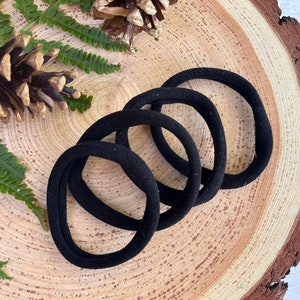 4 bandas elásticas para el cabello negras