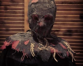 De beul Scarecrow eng Halloween-masker