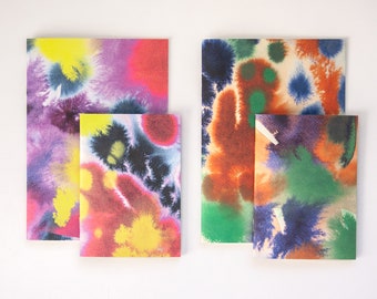 Set of 4 notebooks with watercolor