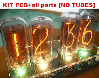 May include: A digital clock kit with four vacuum tubes displaying the numbers 1, 2, 3, and 6 in a warm orange glow. The kit includes a PCB and all parts, with the text "KIT PCB+all parts [NO TUBES]" at the top.