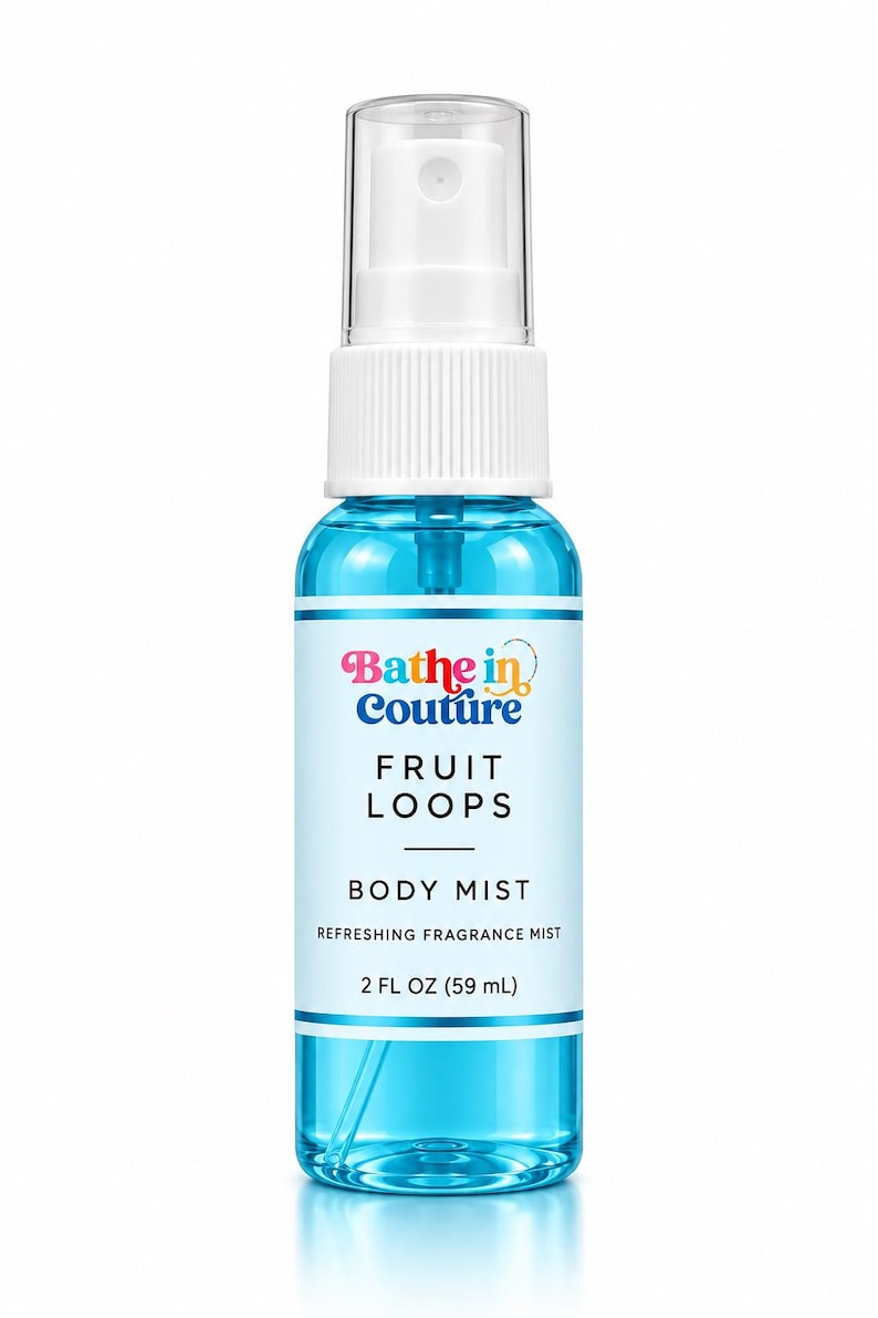 May include: A clear plastic spray bottle filled with bright blue liquid. The label features the text Bathe in Couture, FRUIT LOOPS, BODY MIST, REFRESHING FRAGRANCE MIST, and 2 FL OZ (59 mL). It has a white pump and a clear cap.
