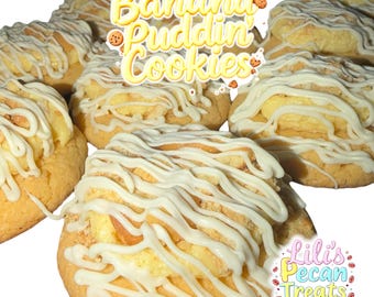 May include: A collection of round, golden-brown cookies topped with a yellow pudding center and drizzled with white icing. The text "Banana Puddin' Cookies" and "Lili's Pecan Treats & More" is overlaid on the image of the baked goods.