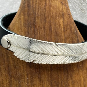 Silver Feather Bracelet on Leather Cuff made from Vintage and Antique Repurposed Knife Blade.  Hand Etched Feather unique gift him or her