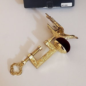 Gold Colored New Sewing Bird Clamp, Red Velvet Pin Cushion on Top, Turn Key to Clamp to Edge of Table, Reproduction in Gift Box