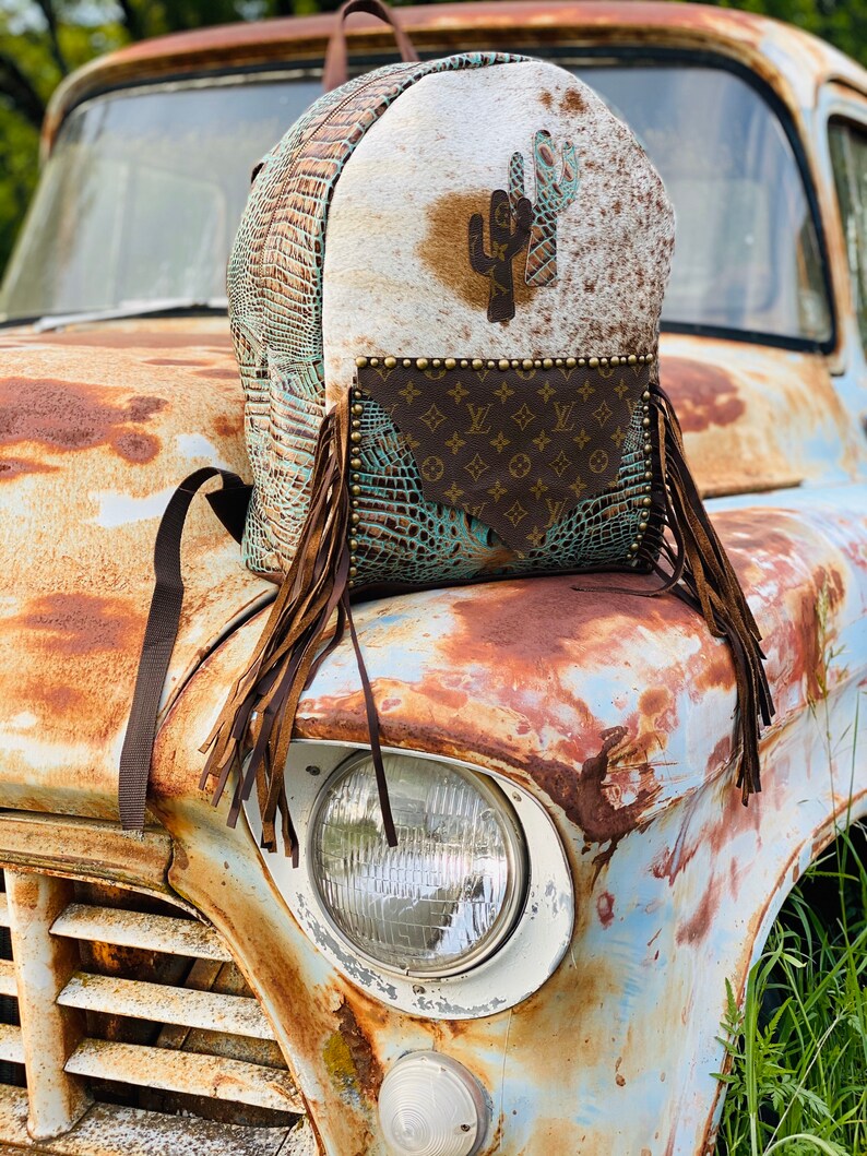 cowhide backpack purses