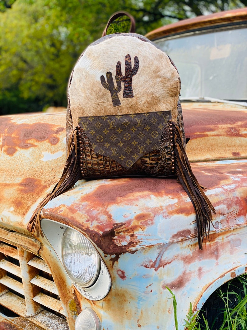 cowhide backpack purses