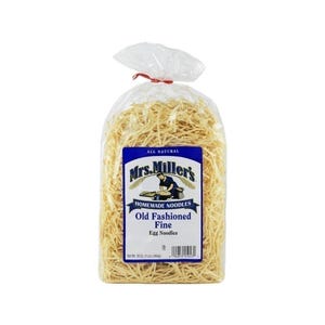 May include: A clear plastic bag filled with thin, light yellow egg noodles. The label features the text Mrs. Miller's Homemade Noodles, Old Fashioned Fine Egg Noodles, and All Natural, with a net weight of 16 oz (1 lb).