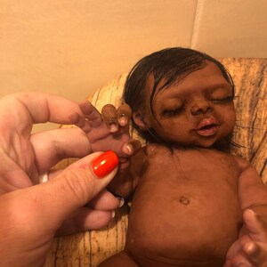 Brown silicone cheap baby dolls