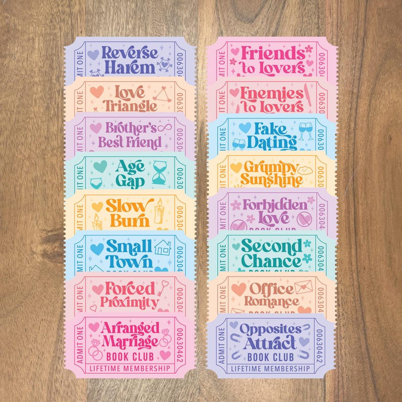 May include: A collection of colorful ticket-style cards with various romance novel themes, including "Reverse Harem," "Friends to Lovers," and "Arranged Marriage." Each card features decorative elements and the words "Book Club" and "Lifetime Membership."