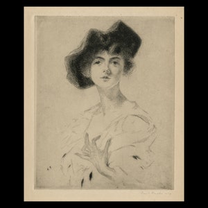 May include: A black and white etching of a woman wearing a hat. The woman is looking directly at the viewer. The etching is signed "Paul  Troubetzkoy 1909".