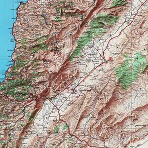 A vintage road and tourist map of Lebanon, showing geographical details and transportation routes.
