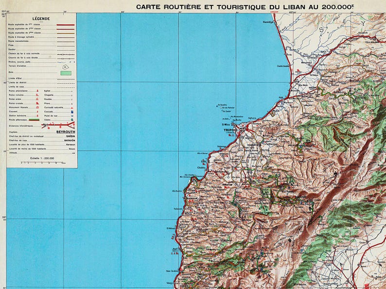 A vintage road and tourist map of Lebanon, showing geographical details and transportation routes.
The map shows the cities of Beirut, Tripoli, and Saida.