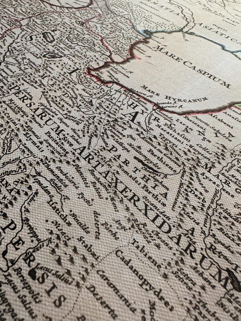 Historical map showing the Roman Empire and surrounding barbarian tribes in 400 AD, by cartographer Guillaume Delisle.