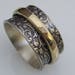 see more listings in the Spinner Rings section