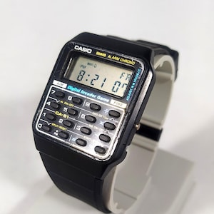 Casio calculator watch with game sale