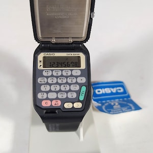 Casio flip top sale watch