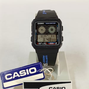 ビンテージ　CASIO　２本 Casio Quartz MD-702 Day/Date 394 Two Tone Diver Vintage Men's