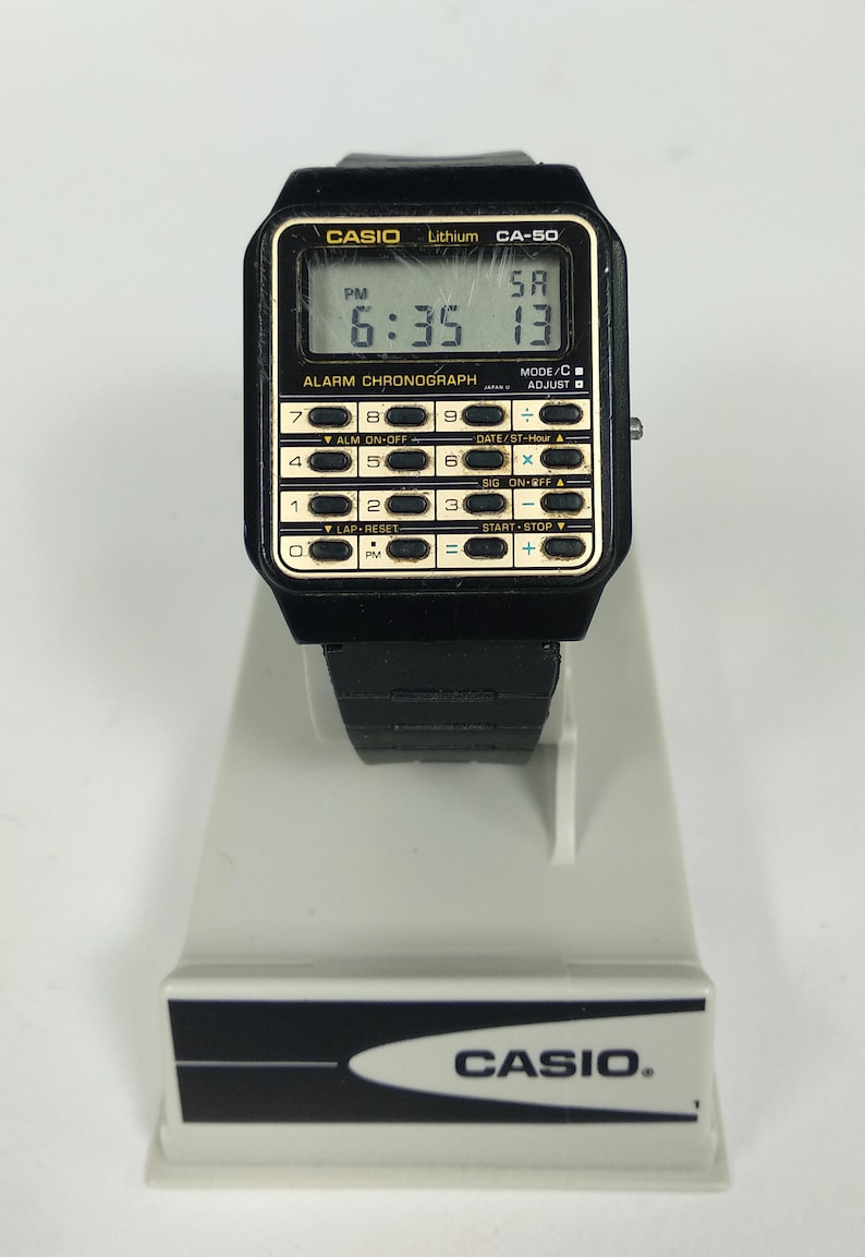 casio watch gold calculator