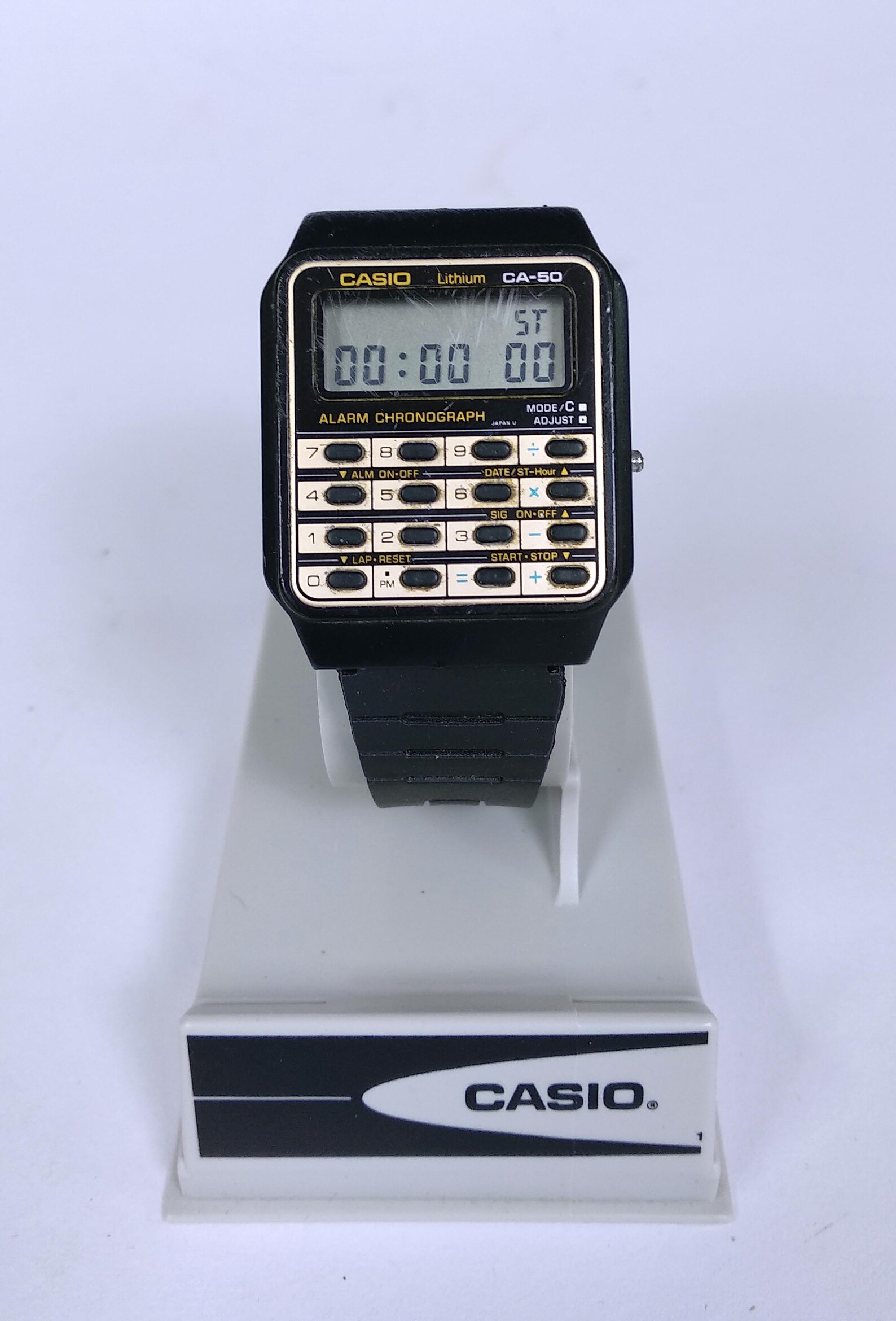 casio watch gold calculator
