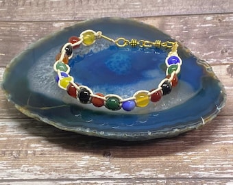 Rainbow gemstone beads on braided natural hemp bracelet, handmade