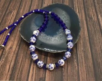 Sapphire blue and white ceramic flower bead necklace, handmade