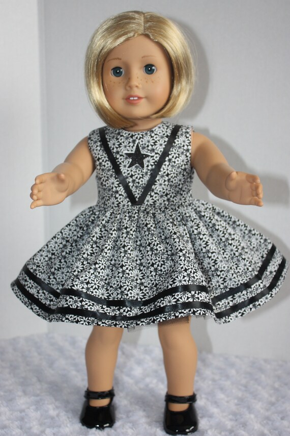 white dress with black ribbon
