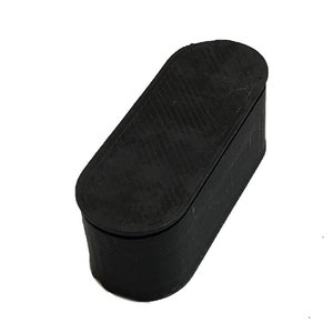 May include: A black oval-shaped storage container with a smooth, textured surface.