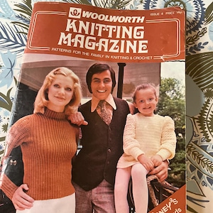 May include: A vintage Woolworth Knitting Magazine, Issue 4, featuring a family portrait and patterns for knitting and crochet. The cover is predominantly orange with the magazine title in large white letters. The magazine also features Walt Disney's Robin Hood.