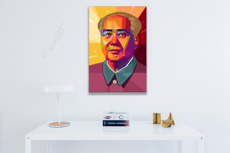 May include: A colorful pop art portrait of a man with a red, yellow, and blue color scheme. The man is wearing a red and green shirt. The background is yellow with red and blue accents.
