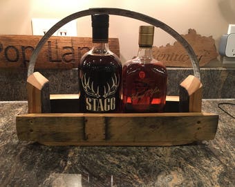 Bourbon bottle display table top holder. Made from bourbon barrel staves.