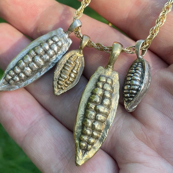 Cocoa Pod Pendants - Sure, some people like chocolate but do they really? Prove it with the precursor to the tasty stuff!