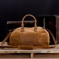 Handmade Leather Duffel Bag – Carry-On Travel Weekender with Laptop Compartment and Crossbody Strap product logo