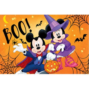 May include: Mickey Mouse and Minnie Mouse dressed in Halloween costumes. Mickey is a vampire with a red cape and Minnie is a witch with a purple dress and hat. They are holding a jack-o-lantern and the text "BOO!" is in the background.