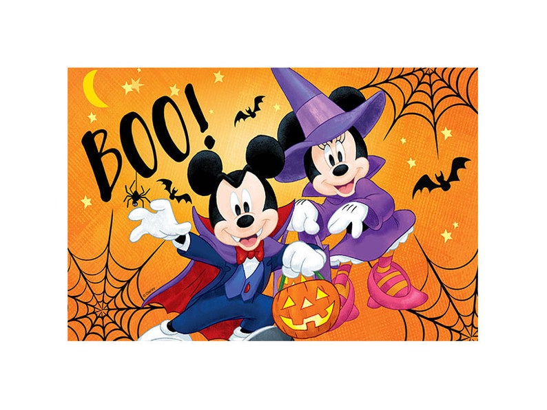 May include: Mickey Mouse and Minnie Mouse dressed in Halloween costumes. Mickey is a vampire with a red cape and Minnie is a witch with a purple dress and hat. They are holding a jack-o-lantern and the text "BOO!" is in the background.