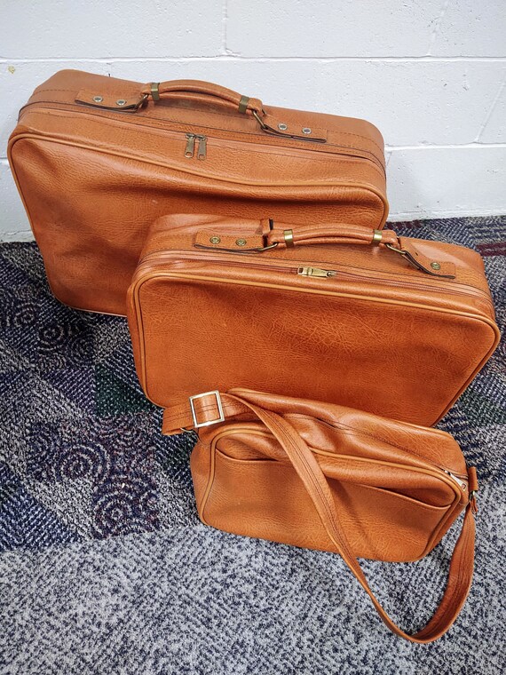 Vintage Mercury Luggage Set
