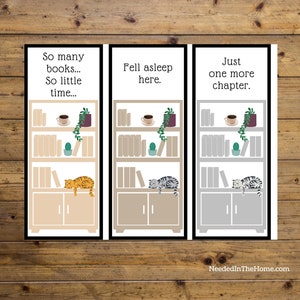May include: Three rectangular bookmarks featuring illustrations of bookshelves with books, a coffee cup, a plant, and a cat. The first reads So many books... So little time..., the second Fell asleep here., and the third Just one more chapter.
