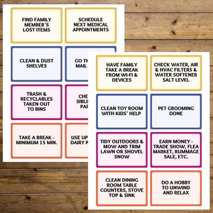 May include: Two sheets of colorful task cards with various household chores and reminders. Each card has a colored border and text such as "Find Family Member's Lost Items" and "Clean Toy Room With Kids' Help."